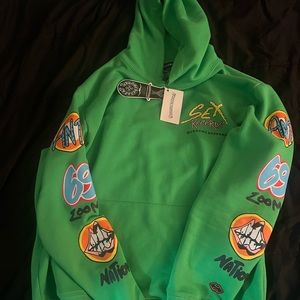 Green Graphic Hoodie with Colorful Designs